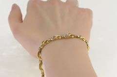 14K Yellow Gold 3.41 Ctw Diamond Wavy Infinity Link Tennis Bracelet