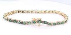 Handsome Yellow Gold Emerald and Diamond accent Bracelet