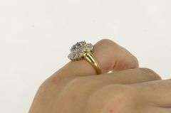 14K Yellow Gold Oval Tanzanite Diamond Halo Engagement Ring