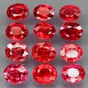 Brilliant 3.84ct fancy red orange Songean Sapphire set