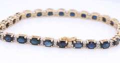 Attractive Yellow Gold Oval Blue Sapphire and Diamond accent Bracelet