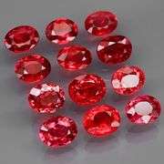 Brilliant 3.84ct fancy red orange Songean Sapphire set