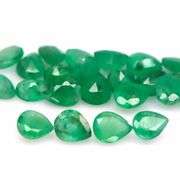 Pear cut 6.92ct Zambian Emerald set