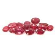 Rich 9.18ct oval cut imperial red Ruby set