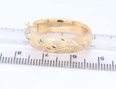 Beautiful Yellow Gold Diamond Cut Textured U Hoop Earrings
