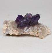 Step-like 244.78ct natural Amethyst in matrix