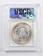 NS64+ 1881-O Morgan Silver Dollar USCG