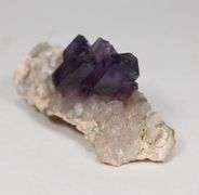 Step-like 244.78ct natural Amethyst in matrix