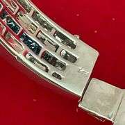 CERTIFIED BRAND NEW 14K WHITE GOLD AND DIAMOND BANGLE BRACELET