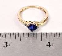 Adventurous Synthetic Blue Sapphire and Diamond Ring In Yellow Gold