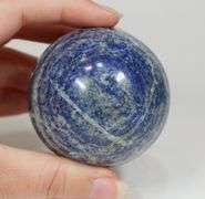 Eye catching 1,620ct bullseye Lapis sphere