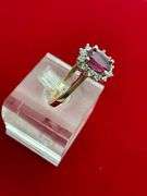 LADIES 14K GOLD DIAMOND AND RUBY RING