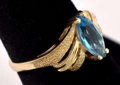 Dazzling Blue Topaz Gem Ring in 14K Yellow Gold