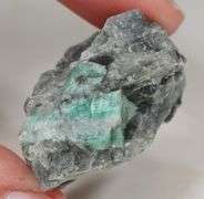 134.12ct raw Emerald with matrix
