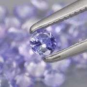 Heavy flashing 3.83ct diamond cut Tanzanite set