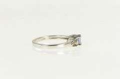 10K White Gold Oval Tanzanite Diamond Cluster Accent Ring