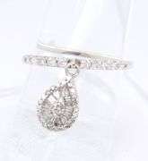 Dazzling Platinum Baguette and Round Diamond Dangle Ring