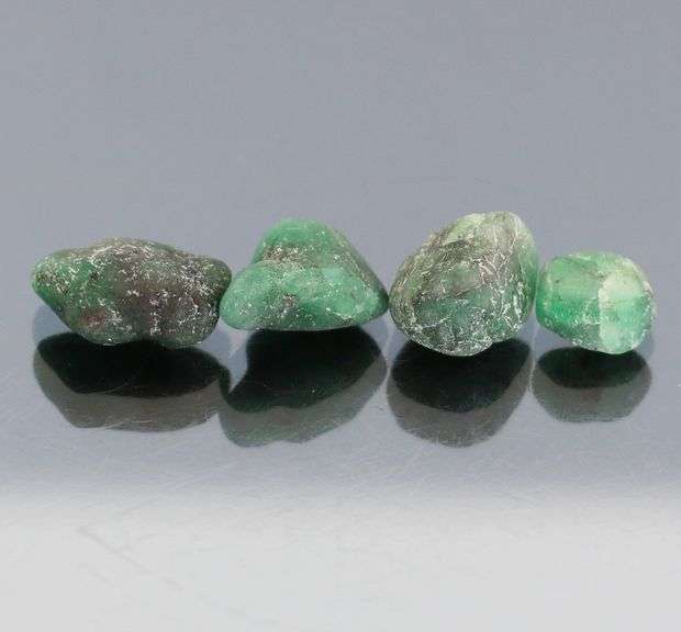 Untreated 10.99ct collectors uncut Emerald set