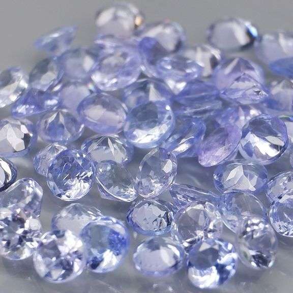 Heavy flashing 3.89ct diamond cut Tanzanite set