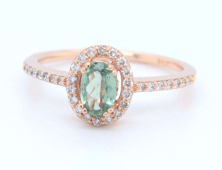 Charming Rose Gold oval Green Spinel in Diamond Halo Ring