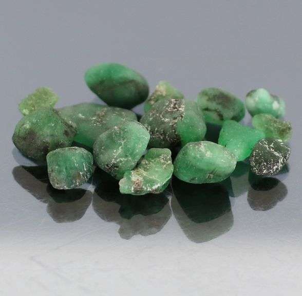Collectable 10.13ct uncut Emerald set