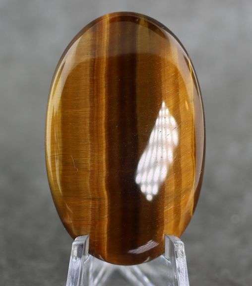 Full body shimmer! 59.04ct Golden Tiger Eye cabochon