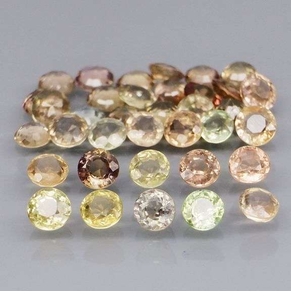 Fantastic 4.59ct round cut Sapphire set