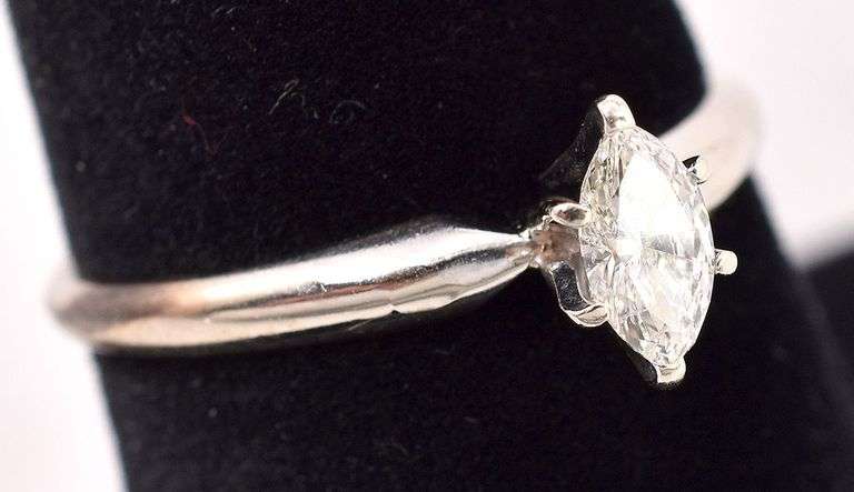 Delightful 14K white Gold Solitaire Diamond Ring