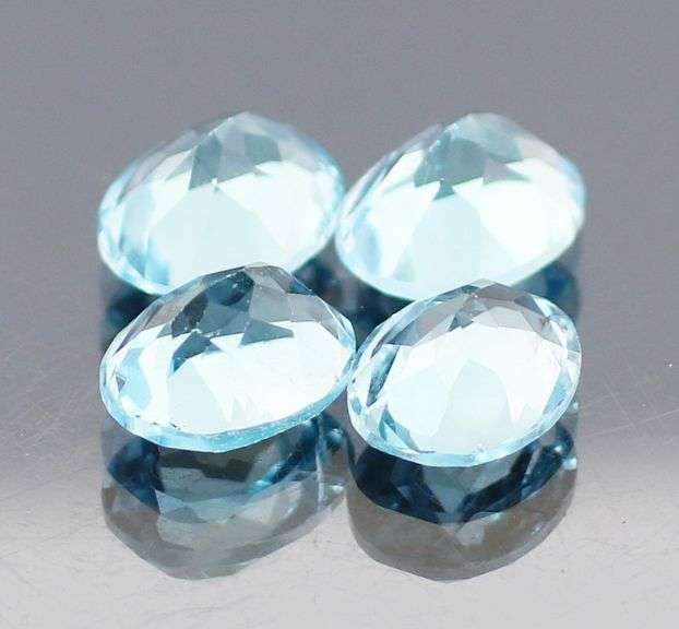 Large 13.58ct vivid sky blue Topaz set