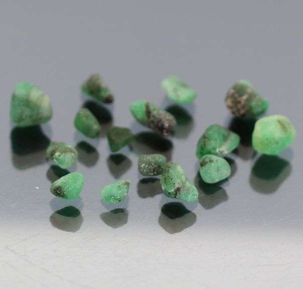 Untreated 10.23ct collectors uncut Emerald set