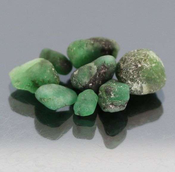 Collectable 10.50ct uncut Emerald set