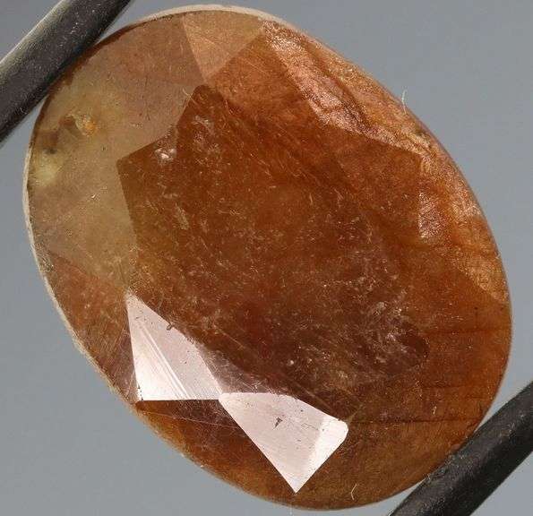 UNTREATED! Shimmering 16.74ct earth toned faceted Sapphire