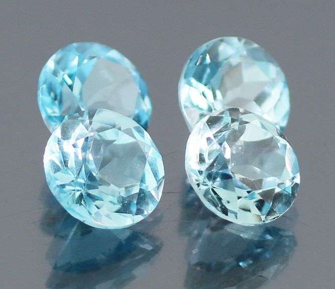 Matched! 4 piece 14.30ct full fire sky blue Topaz set