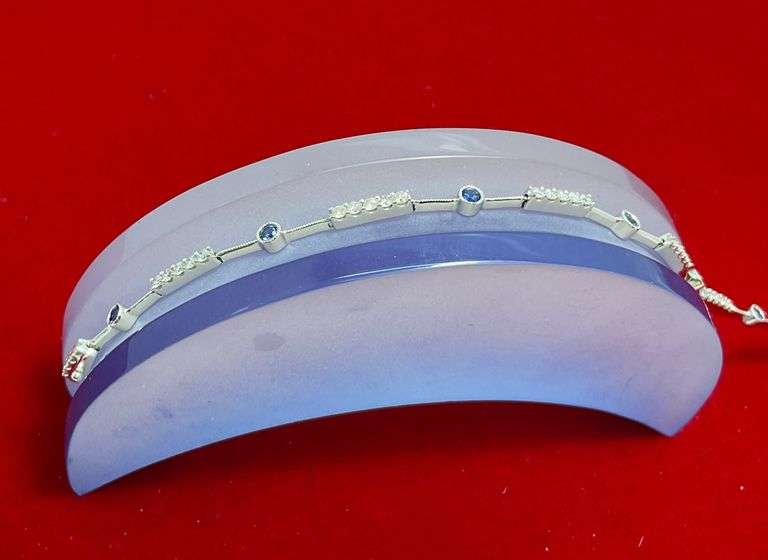 CERTIFIED 18K WHITE GOLD DIAMOND AND SAPPHIRE BRACELET.