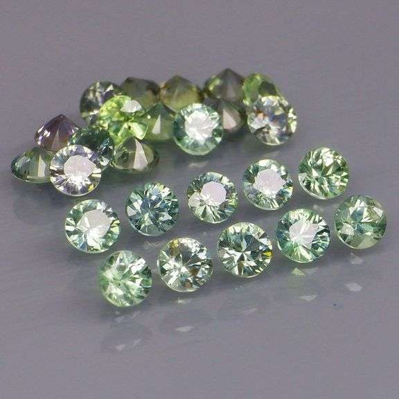 Fantastic 3.02ct diamond cut GREEN Sapphire set