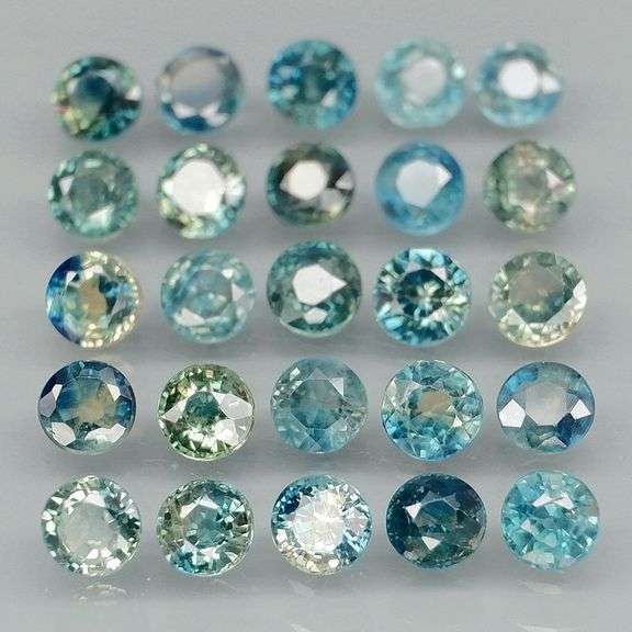 Heated only! 4.12ct blue green Sapphire set