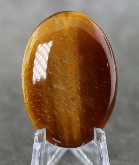 Outstanding 44.48ct golden Tiger Eye cabochon
