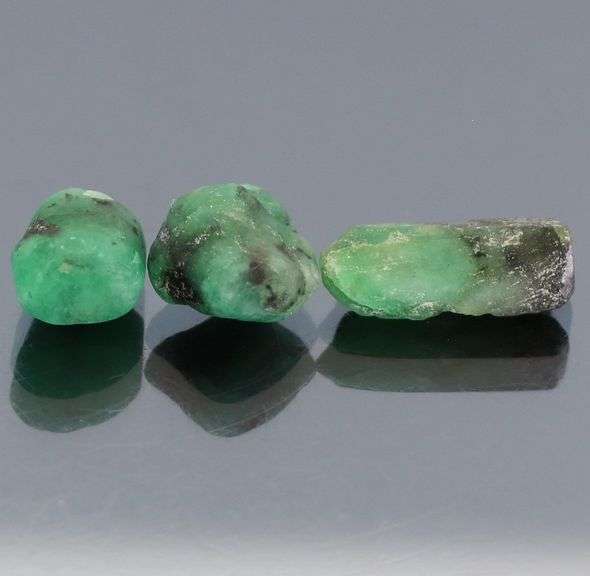 Untreated 11.81ct collectors uncut Emerald set