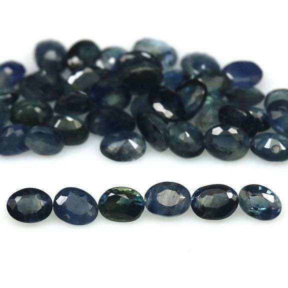 Heated only! 7.53ct blue green Sapphire set