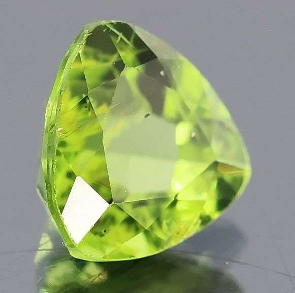 Glittering 3.31ct trillion cut Peridot