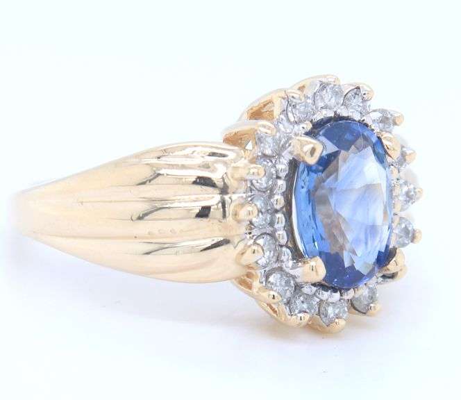 Handsome Yellow Gold 1.80ct Oval Blue Sapphire and Diamond Halo Ring