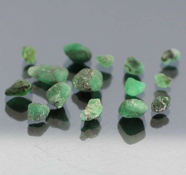 Collectable 10.13ct uncut Emerald set