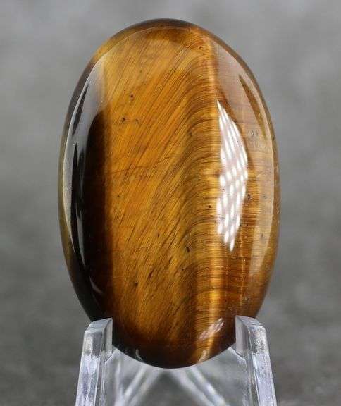 Outstanding 45.48ct golden Tiger Eye cabochon