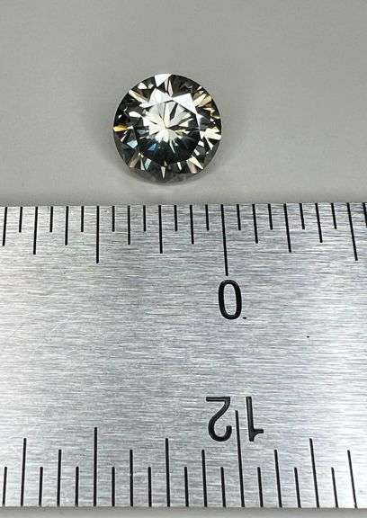Phenominal Rare 5.48 Ct Golden Bronze Fire Moissanite