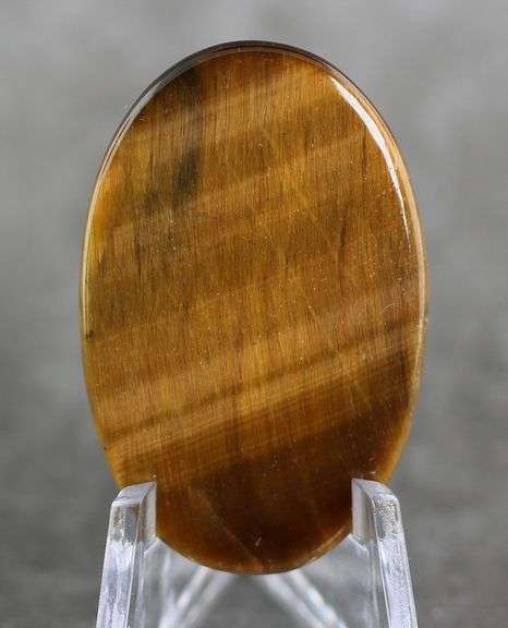 Look at that shimmer! 39.30ct Golden Tiger Eye cabochon