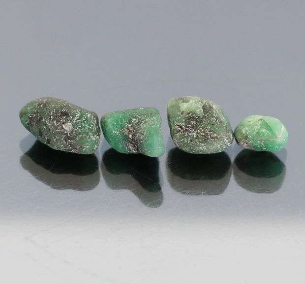 Untreated 10.99ct collectors uncut Emerald set