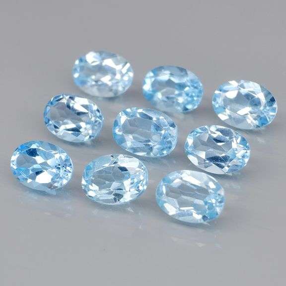 Matched! 9 piece 8.46ct full fire swiss blue Topaz set