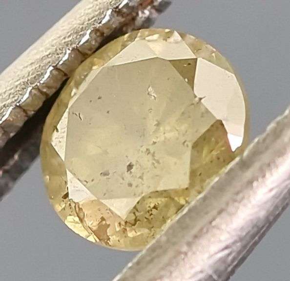 Gorgeous .29ct silvery yellow Diamond solitaire