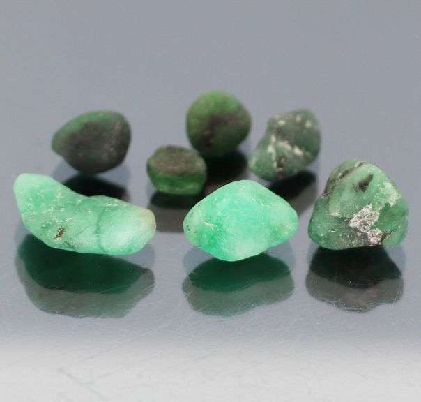 Untreated 11.23ct collectors uncut Emerald set
