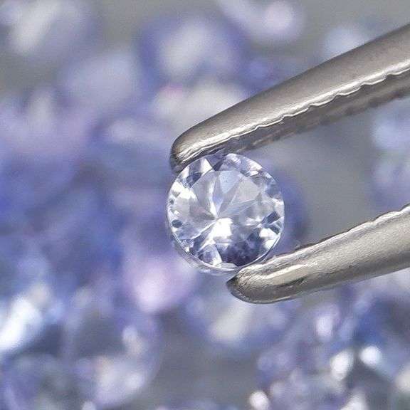 Heavy flashing 3.89ct diamond cut Tanzanite set